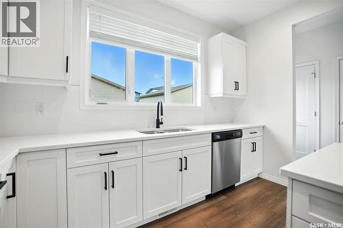 127 Taube Avenue, Saskatoon, SK - Indoor Photo Showing Kitchen With Double Sink