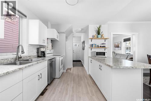 1129 3Rd Avenue Ne, Moose Jaw, SK - Indoor Photo Showing Kitchen With Double Sink