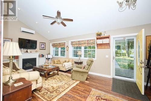 Family room with ceiling fan & vaulted ceiling - 662 Lakeshore Road, Fort Erie (Lakeshore), ON - Indoor Photo Showing Living Room With Fireplace