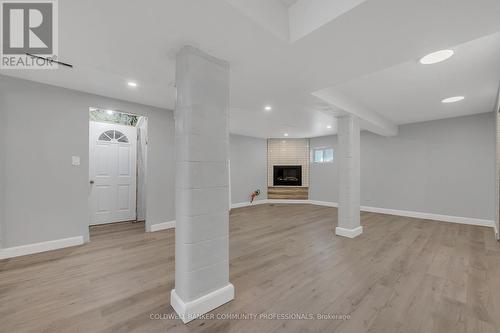 rec room with gas fireplace - 446 East 36Th Street, Hamilton, ON - Indoor