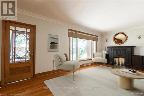 18 Masterson Drive, St. Catharines, ON - Indoor Photo Showing Living Room With Fireplace