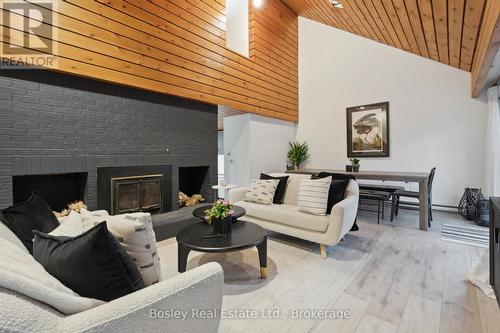 101 St Moritz Crescent, Blue Mountains, ON - Indoor Photo Showing Living Room With Fireplace