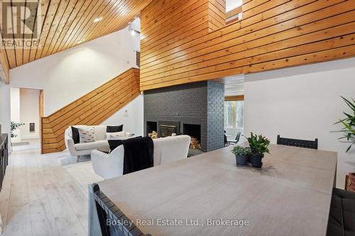 101 St Moritz Crescent, Blue Mountains, ON - Indoor Photo Showing Dining Room With Fireplace