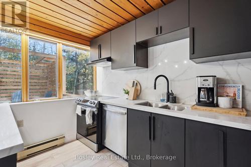 101 St Moritz Crescent, Blue Mountains, ON - Indoor Photo Showing Kitchen With Double Sink