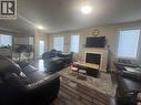 8716 17 Street, Dawson Creek, BC  - Indoor Photo Showing Living Room With Fireplace 