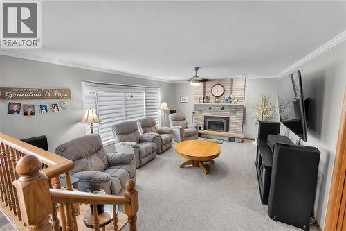 20 Carluccio Crescent, St. Catharines, ON - Indoor Photo Showing Living Room With Fireplace