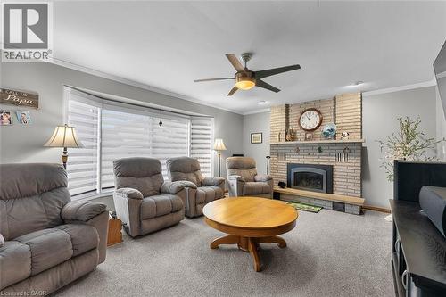 20 Carluccio Crescent, St. Catharines, ON - Indoor Photo Showing Living Room With Fireplace