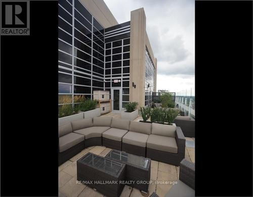 Common space on rooftop with seating and BBQ's. - 404 - 108 Lisgar Street, Ottawa, ON - 