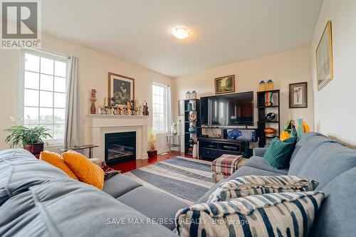 22 Birch Tree Trail, Brampton, ON - Indoor Photo Showing Living Room With Fireplace
