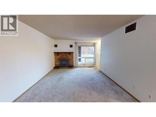 2365 12 Street N Unit# 203, Cranbrook, BC - Indoor With Fireplace
