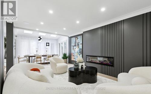 4344 Dallas Court, Mississauga, ON - Indoor With Fireplace