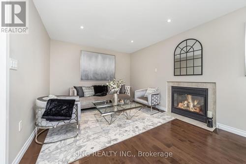 23 Himalaya Street, Brampton, ON - Indoor Photo Showing Living Room With Fireplace