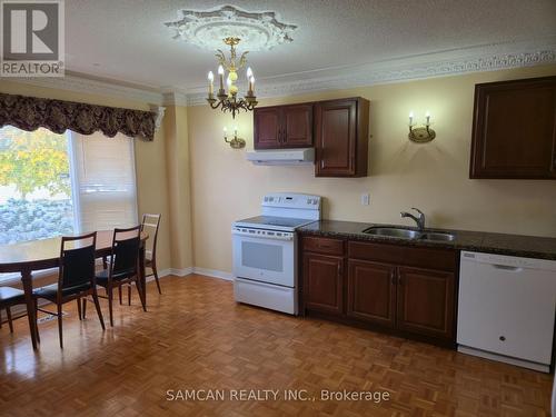 2 - 2470 Wynten Way, Oakville, ON - Indoor Photo Showing Kitchen With Double Sink