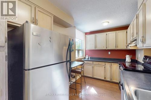 210 - 10 Muirhead Road, Toronto, ON - Indoor Photo Showing Kitchen