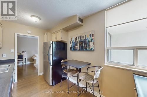 210 - 10 Muirhead Road, Toronto, ON - Indoor Photo Showing Kitchen