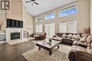 3359 Cougar Road Unit# 19, West Kelowna, BC  - Indoor Photo Showing Living Room With Fireplace 