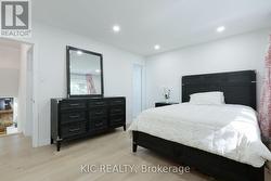 Sun-filled renovated master bedroom - 