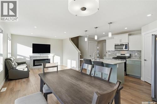 458 Schmeiser Bend, Saskatoon, SK - Indoor With Fireplace