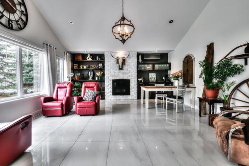 Family room - 249 Rue St-Henri, Napierville, QC - Indoor Photo Showing Other Room With Fireplace