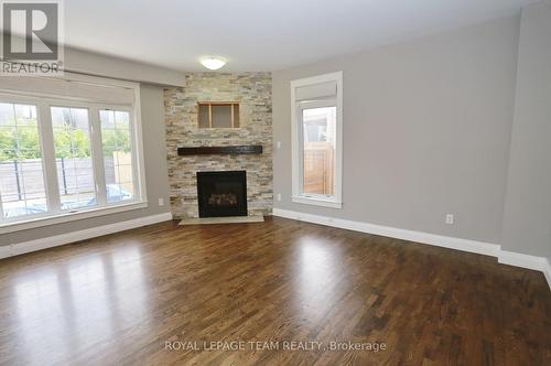 78 Friendly Crescent, Ottawa, ON - Indoor Photo Showing Living Room With Fireplace
