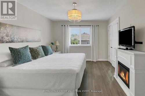 11 Jefferson Court W, Welland, ON - Indoor Photo Showing Bedroom With Fireplace