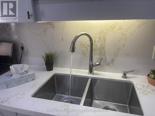 17 - 7385 Magistrate Terrace, Mississauga, ON - Indoor Photo Showing Kitchen With Double Sink