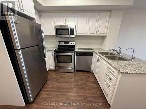506 - 9500 Markham Road, Markham, ON - Indoor Photo Showing Kitchen With Double Sink