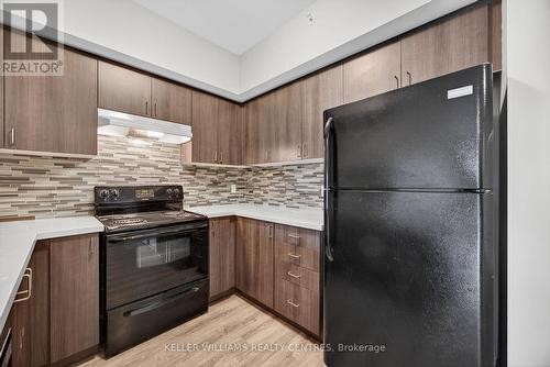 408 - 40 Ferndale Drive S, Barrie, ON - Indoor Photo Showing Kitchen