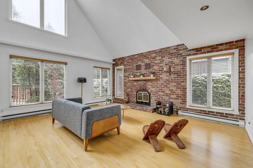 Salon - 1614 Rue Guillebert, Québec (La Haute-Saint-Charles), QC - Indoor Photo Showing Living Room With Fireplace