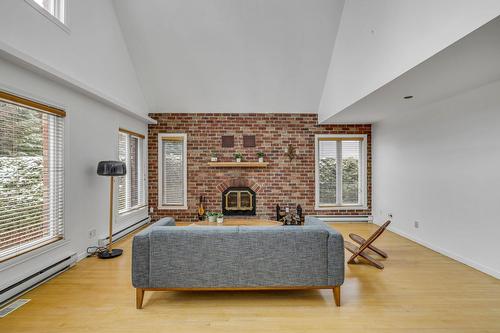 Salon - 1614 Rue Guillebert, Québec (La Haute-Saint-Charles), QC - Indoor Photo Showing Other Room With Fireplace