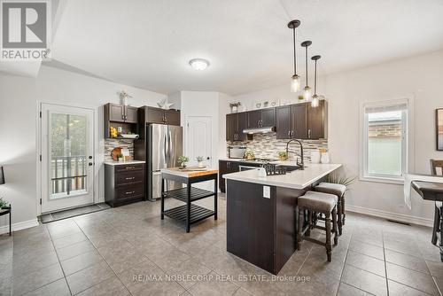 64 Carleton Trail, New Tecumseth, ON - Indoor Photo Showing Kitchen With Upgraded Kitchen