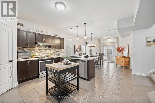 64 Carleton Trail, New Tecumseth, ON - Indoor Photo Showing Kitchen With Upgraded Kitchen