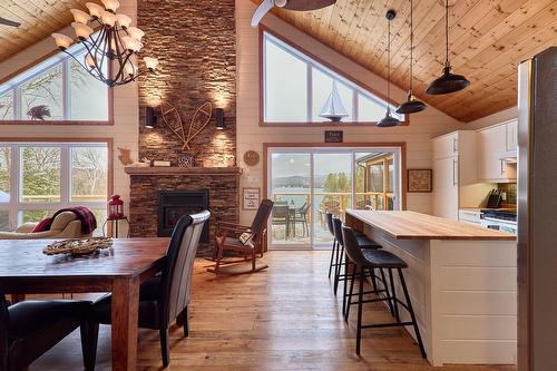 Overall view - 513 Rue Chartier, Entrelacs, QC - Indoor Photo Showing Dining Room With Fireplace