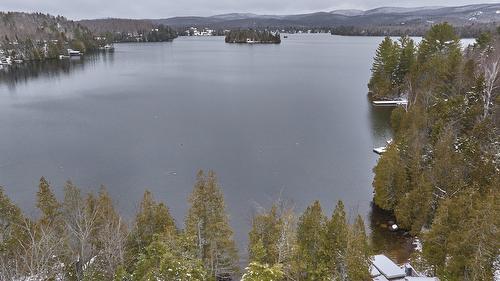 Aerial photo - 513 Rue Chartier, Entrelacs, QC - Outdoor With Body Of Water With View