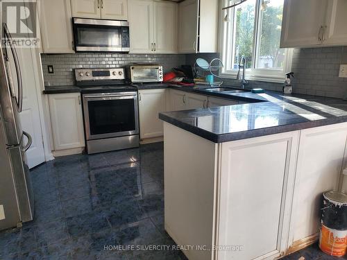 Unit 1-Upper Level - 700 Peter Robertson Boulevard, Brampton, ON - Indoor Photo Showing Kitchen With Double Sink