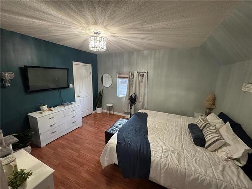 145 1St Street, Brandon, MB - Indoor Photo Showing Bedroom