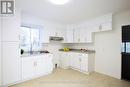 409 Mccamus Avenue, Temiskaming Shores (New Liskeard), ON  - Indoor Photo Showing Kitchen With Double Sink 