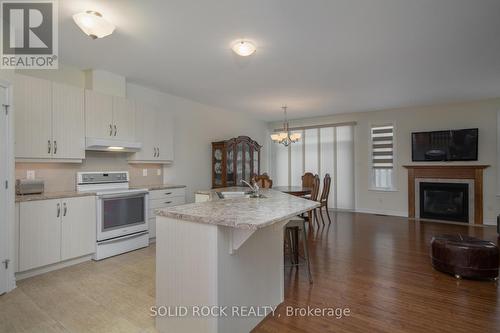 247 Shinny Avenue, Ottawa, ON - Indoor Photo Showing Kitchen With Fireplace With Double Sink