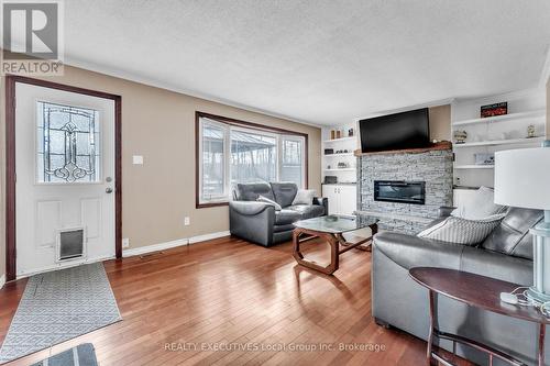42 Riverbend Road, North Bay (Ferris), ON - Indoor Photo Showing Living Room With Fireplace
