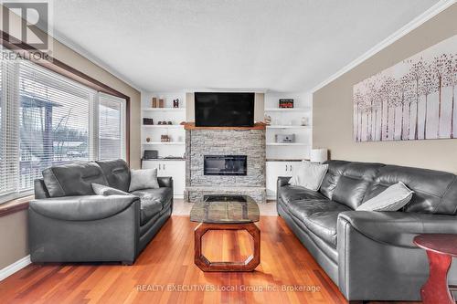 42 Riverbend Road, North Bay (Ferris), ON - Indoor Photo Showing Living Room With Fireplace