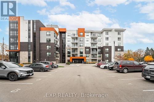 302 - 340 Plains Road E, Burlington, ON - Outdoor With Balcony With Facade