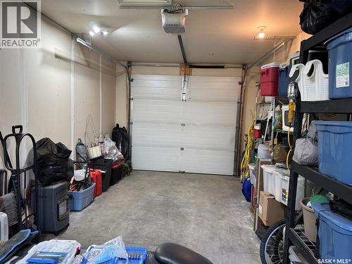 4 110 Centennial Boulevard, Warman, SK - Indoor Photo Showing Garage