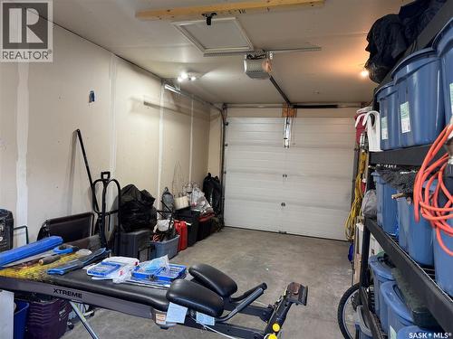 4 110 Centennial Boulevard, Warman, SK - Indoor Photo Showing Garage