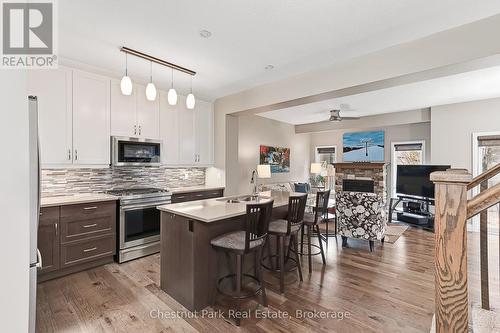 122 Conservation Way, Collingwood, ON - Indoor Photo Showing Kitchen With Fireplace With Upgraded Kitchen