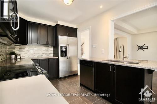 507 Foxlight Circle, Ottawa, ON - Indoor Photo Showing Kitchen With Double Sink
