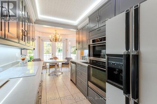 Kitchen/seating area and walkout to upper balcony - 1091 Benton Crescent, Pickering, ON - Indoor Photo Showing Kitchen With Upgraded Kitchen