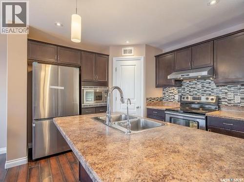 4637 Padwick Road, Regina, SK - Indoor Photo Showing Kitchen With Stainless Steel Kitchen With Double Sink With Upgraded Kitchen