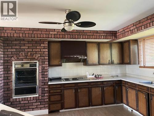 5612 51 Street, Fort Nelson, BC - Indoor Photo Showing Kitchen