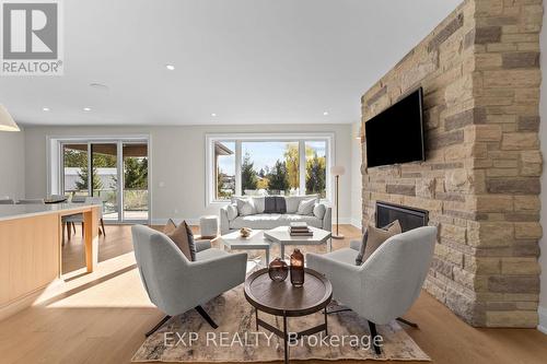 6881 Heathwoods Avenue, London South (South V), ON - Indoor Photo Showing Living Room With Fireplace