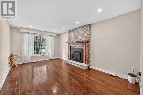 15 Rodney Street, Barrie, ON - Indoor Photo Showing Living Room With Fireplace